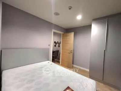 Modern bedroom with minimalist design and spacious wardrobe