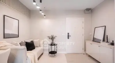 Modern living room with minimalist decor and cozy seating area