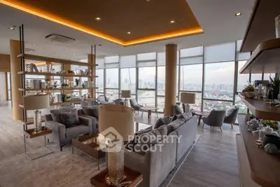 Luxurious high-rise living room with panoramic city views and modern decor