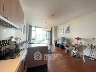 Modern open-layout kitchen and living room with city view and elegant decor