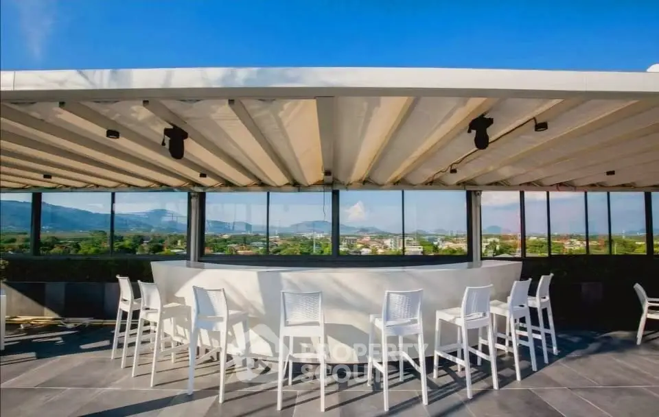 Stunning rooftop terrace with panoramic views and modern seating