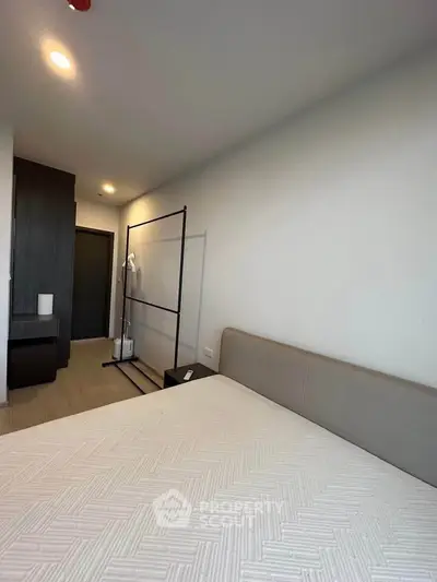 Modern bedroom with minimalist design and neutral tones