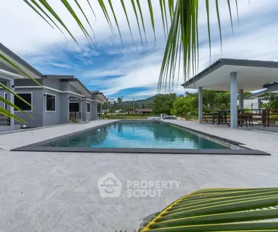 Luxurious modern villa with private pool and stunning outdoor space.