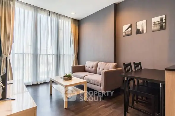 Modern living room with natural light and stylish decor