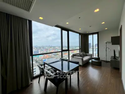Modern living room with panoramic city view and stylish furniture