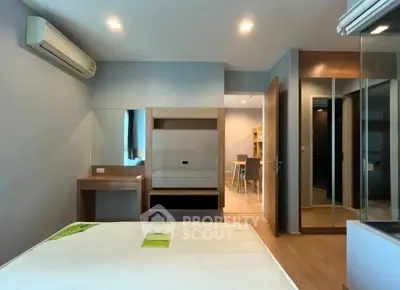 Modern bedroom with sleek design and built-in storage solutions