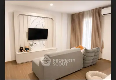 Modern living room with stylish decor and cozy seating area