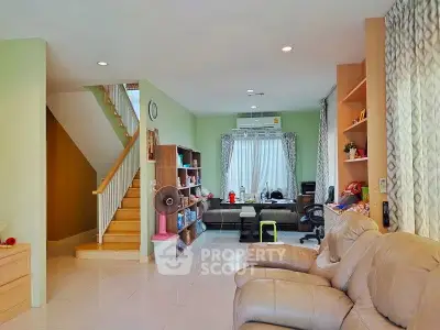 Spacious living room with cozy seating and modern decor