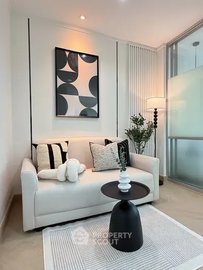 Modern living room with stylish decor and cozy seating area