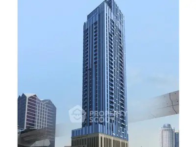Stunning modern skyscraper with sleek design in urban skyline, perfect for luxury living or investment.