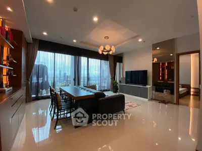 Spacious modern living room with large windows and elegant decor