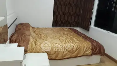 Cozy bedroom with modern decor and large window