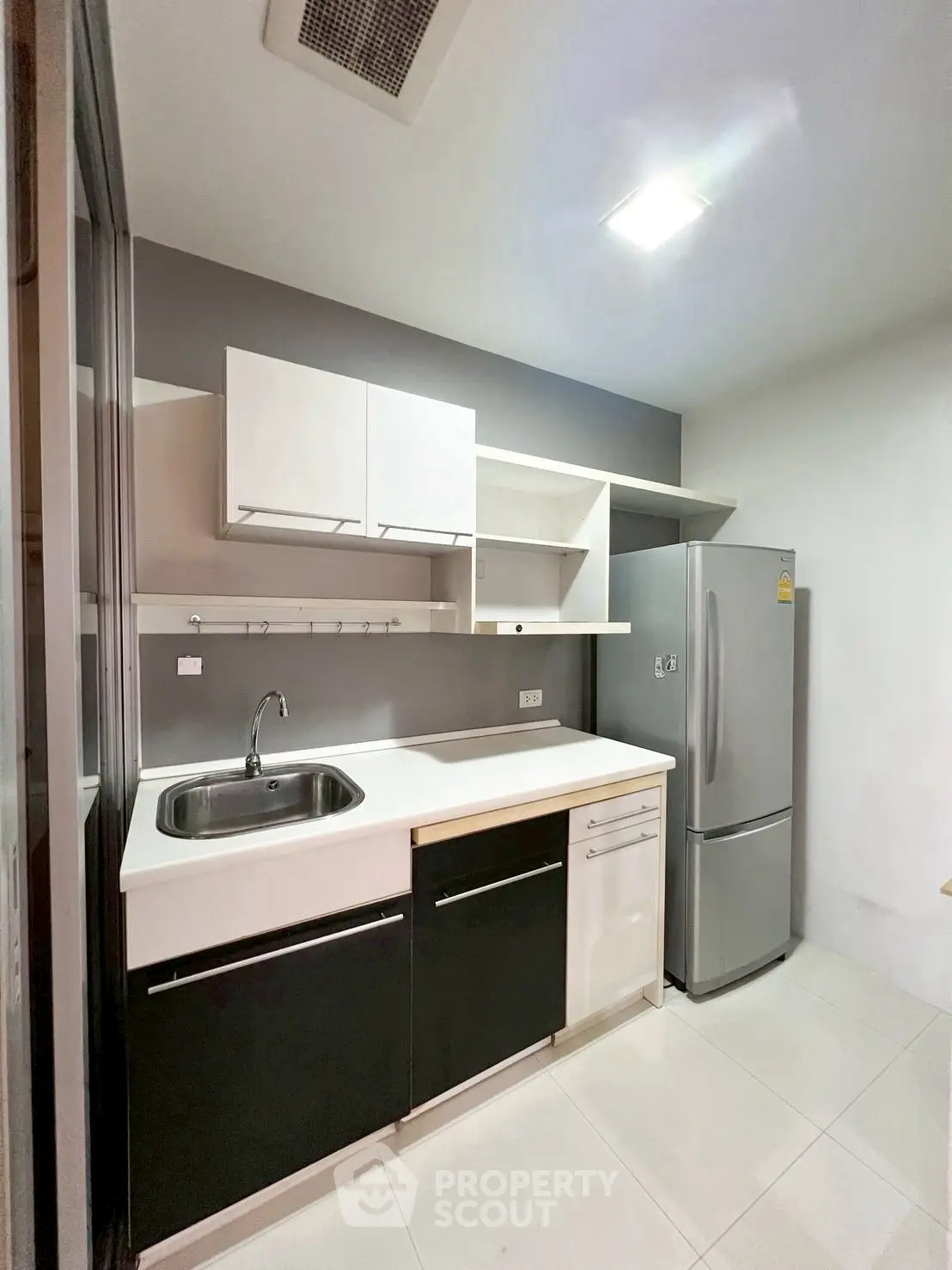 Modern kitchen with sleek cabinetry and stainless steel appliances