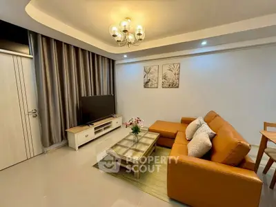 Stylish living room with modern decor and cozy seating area, perfect for relaxation and entertainment.