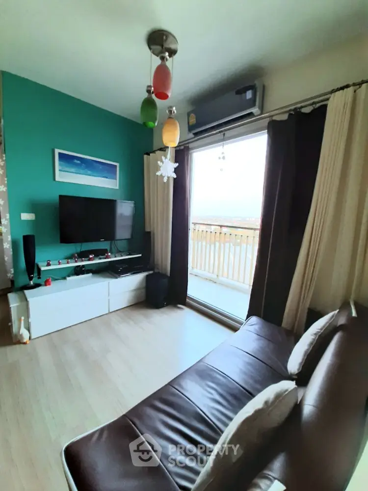 Modern living room with balcony view and stylish decor