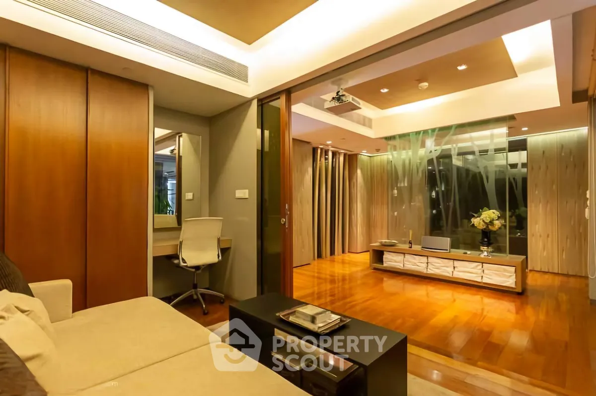 Luxurious modern living room with elegant wooden flooring and stylish decor