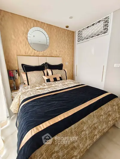 Luxurious bedroom with elegant decor and stylish bedding in modern apartment
