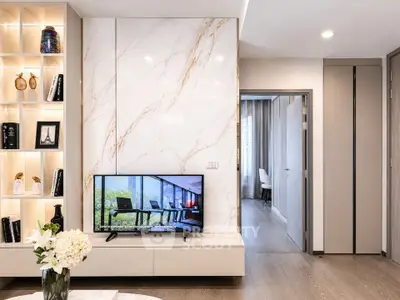 Modern living room with elegant marble wall and stylish decor