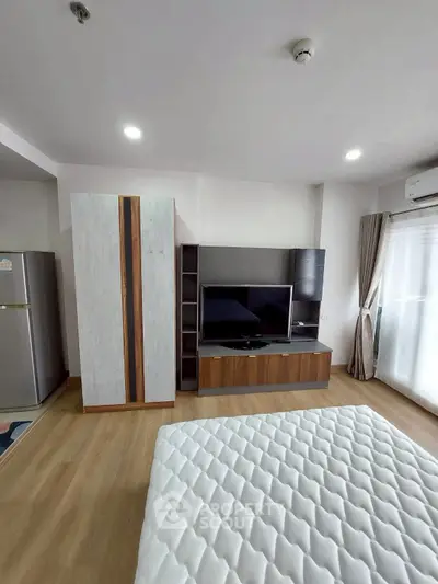 Modern bedroom with stylish furniture and natural light