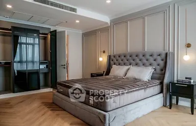 Luxurious bedroom with plush bed and elegant decor in modern apartment