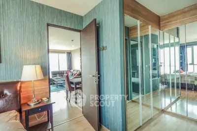 Spacious modern apartment with stylish decor and mirrored wardrobe