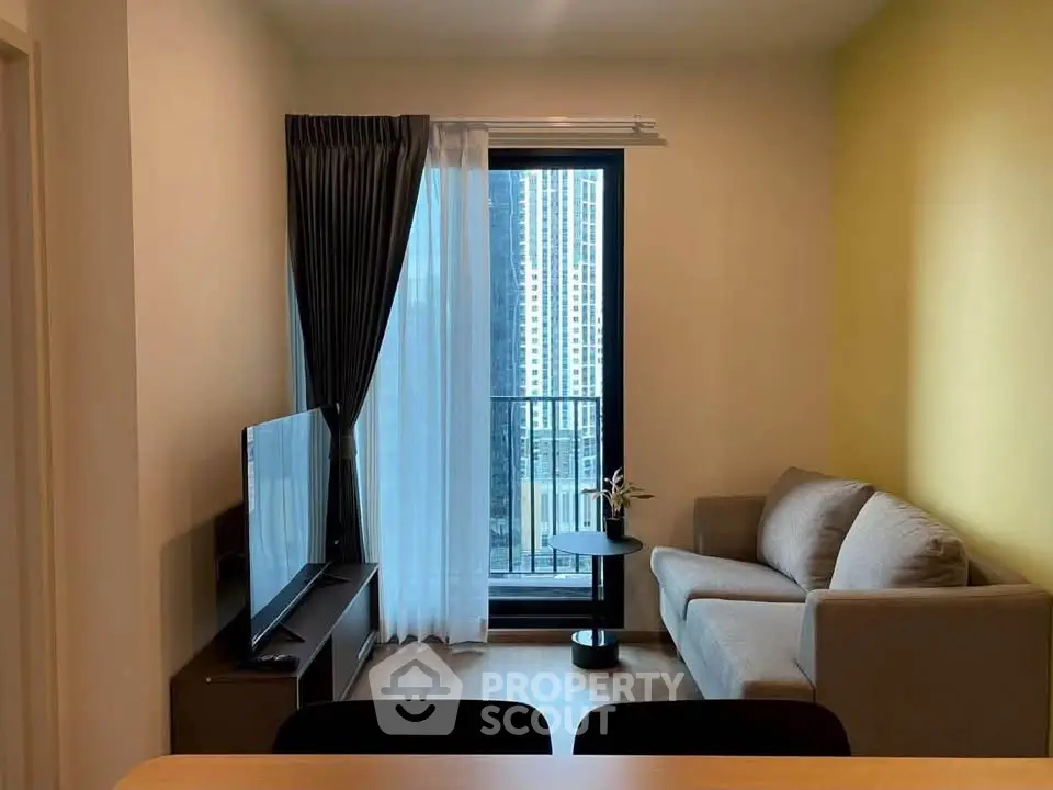 Modern living room with balcony view in urban apartment