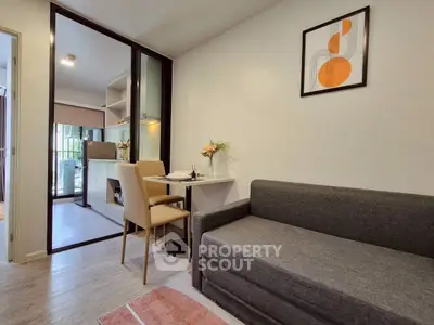 Modern living room with stylish decor and open kitchen layout