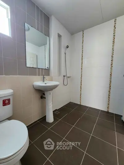 Modern bathroom with sleek design and spacious shower area
