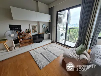 Modern living room with balcony view and stylish decor