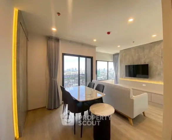 Modern living room with city view, sleek furniture, and ambient lighting