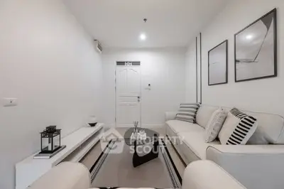 Modern minimalist living room with sleek furniture and stylish decor