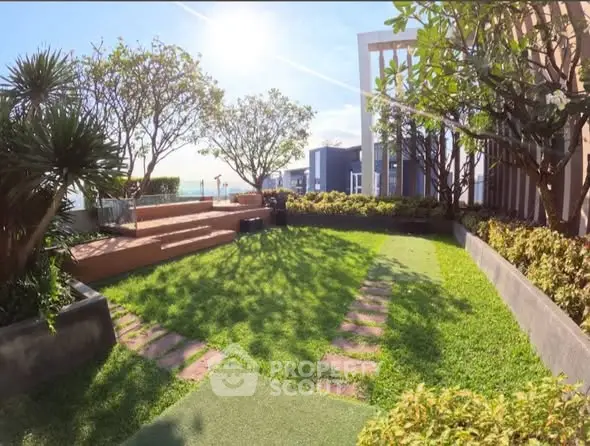 Stunning rooftop garden with lush greenery and seating area, perfect for relaxation and enjoying city views.