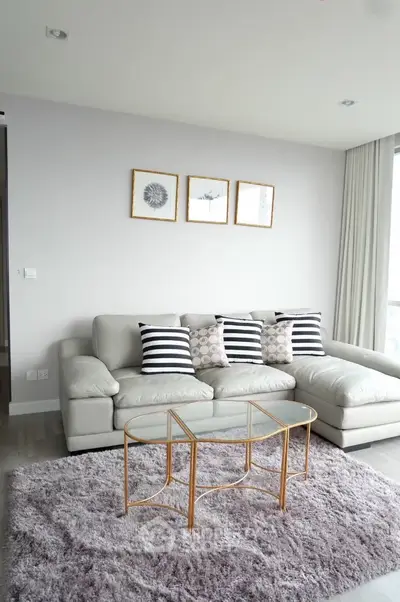 Modern living room with stylish decor and cozy sectional sofa