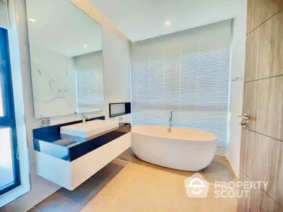 Luxurious modern bathroom with freestanding bathtub and elegant fixtures