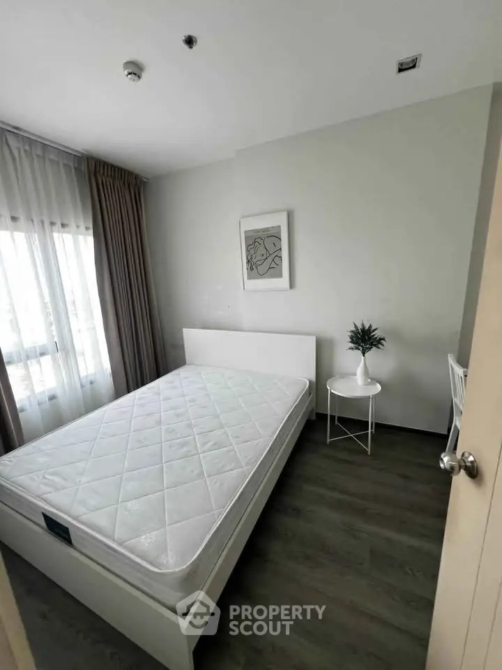 Cozy bedroom with minimalist decor and natural light