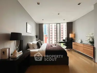 Luxurious modern bedroom with city view and elegant decor