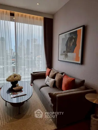 Stylish living room with city view, modern decor, and cozy seating area.