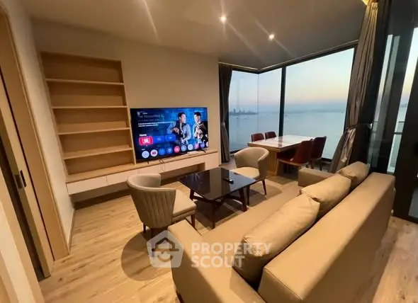 Modern living room with stunning ocean view and stylish furniture