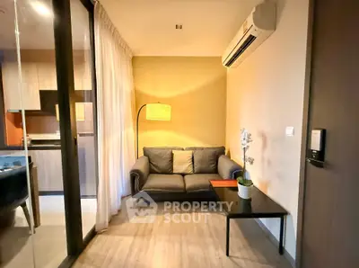 Cozy living room with modern decor and air conditioning