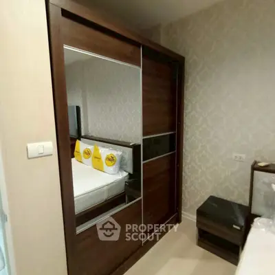 Modern bedroom with stylish wardrobe and elegant decor