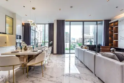 Luxurious open-plan living space with marble flooring, elegant dining area, and plush seating, complemented by panoramic city views through floor-to-ceiling windows.