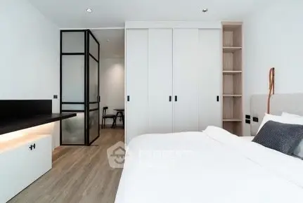 Modern bedroom with sleek design and built-in storage