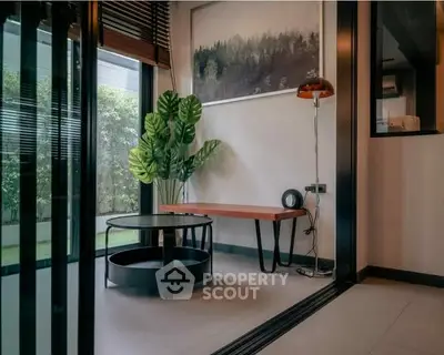 Stylish modern living room with large windows and elegant decor