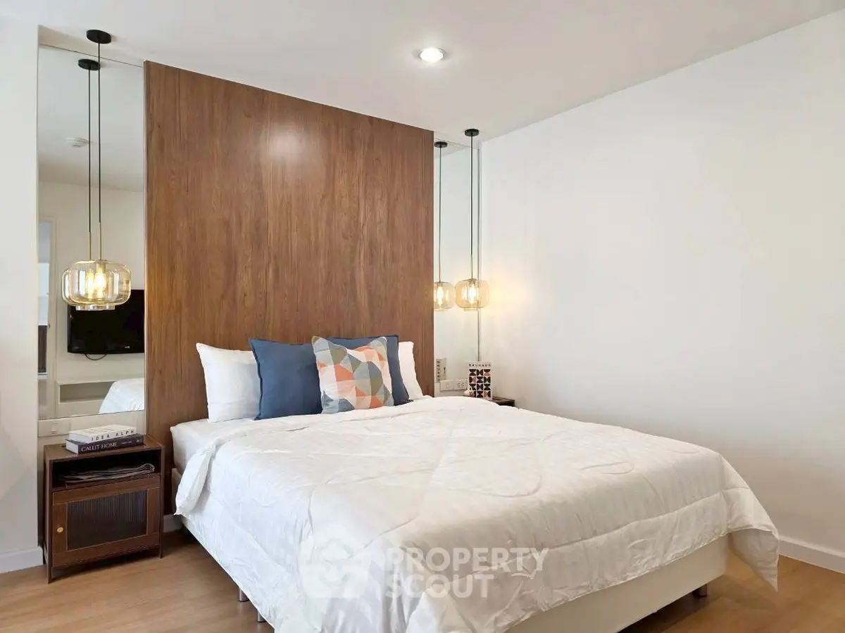 Modern bedroom with stylish decor and cozy ambiance