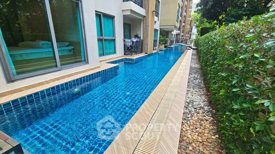 Luxurious apartment with stunning poolside view and modern amenities