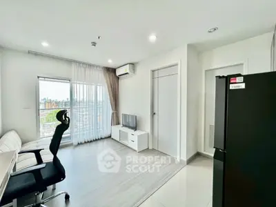 Modern living room with sleek furniture and balcony view