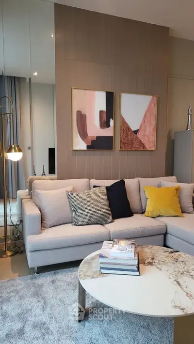 Stylish modern living room with cozy sectional sofa and chic decor