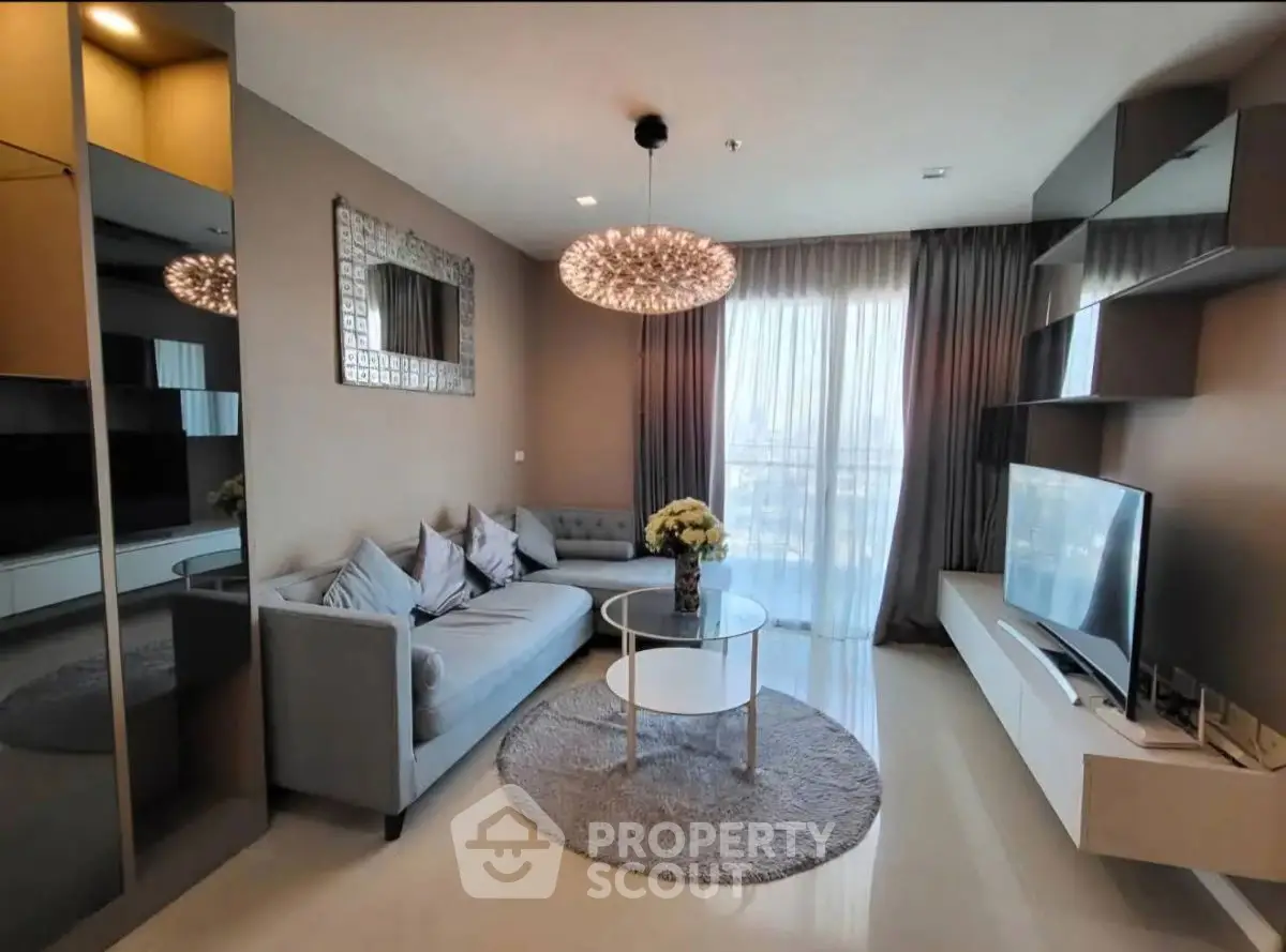 Modern living room with elegant decor and large window view