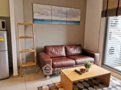 Modern living room with leather sofa and stylish decor