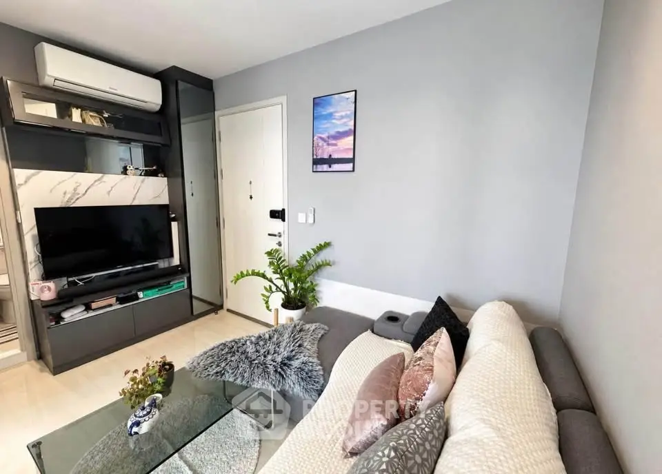 Modern living room with sleek decor and cozy seating area